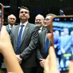Imagem editorial de apoio sobre oficial.