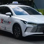 Veículo elétrico BYD Seal 5 DM-i Dynamic Xpress em via urbana.