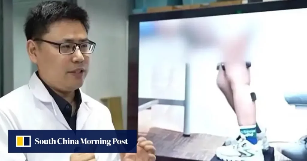 Pesquisador discute uso de robô em tratamento para crianças com distúrbio neurológico. (Foto: scmp.com)