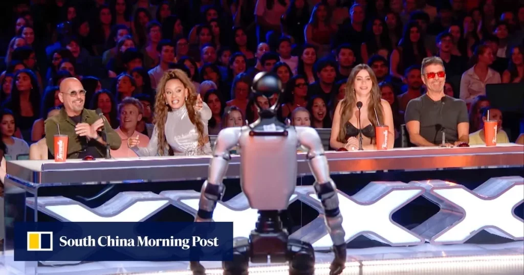 Robô da Unitree se apresenta no palco do America’s Got Talent, recebendo aplausos do público e dos jurados.